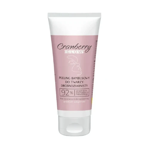 Różowa tubka peelingu bambusowego do twarzy drobnoziarnistego Cranberry Glow z napisem 92% składników naturalnych i oznaczeniem produktu wegańskiego